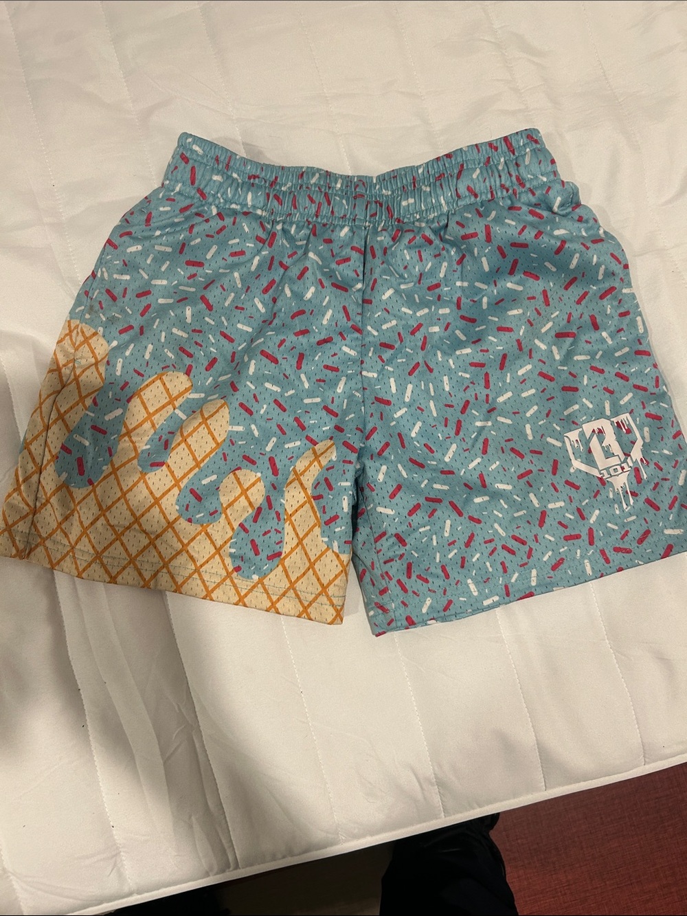 Kids Blue Ice Cream Pattern Swim Shorts with Yellow Accent